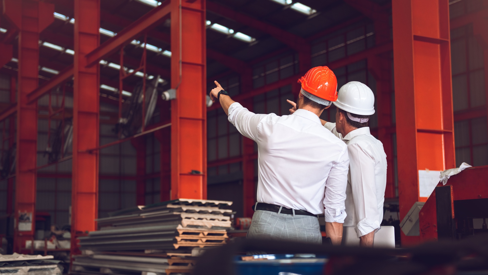 Collaborative Excellence: Factory Worker Foreman and Engineer Manager at Industrial Worksite
